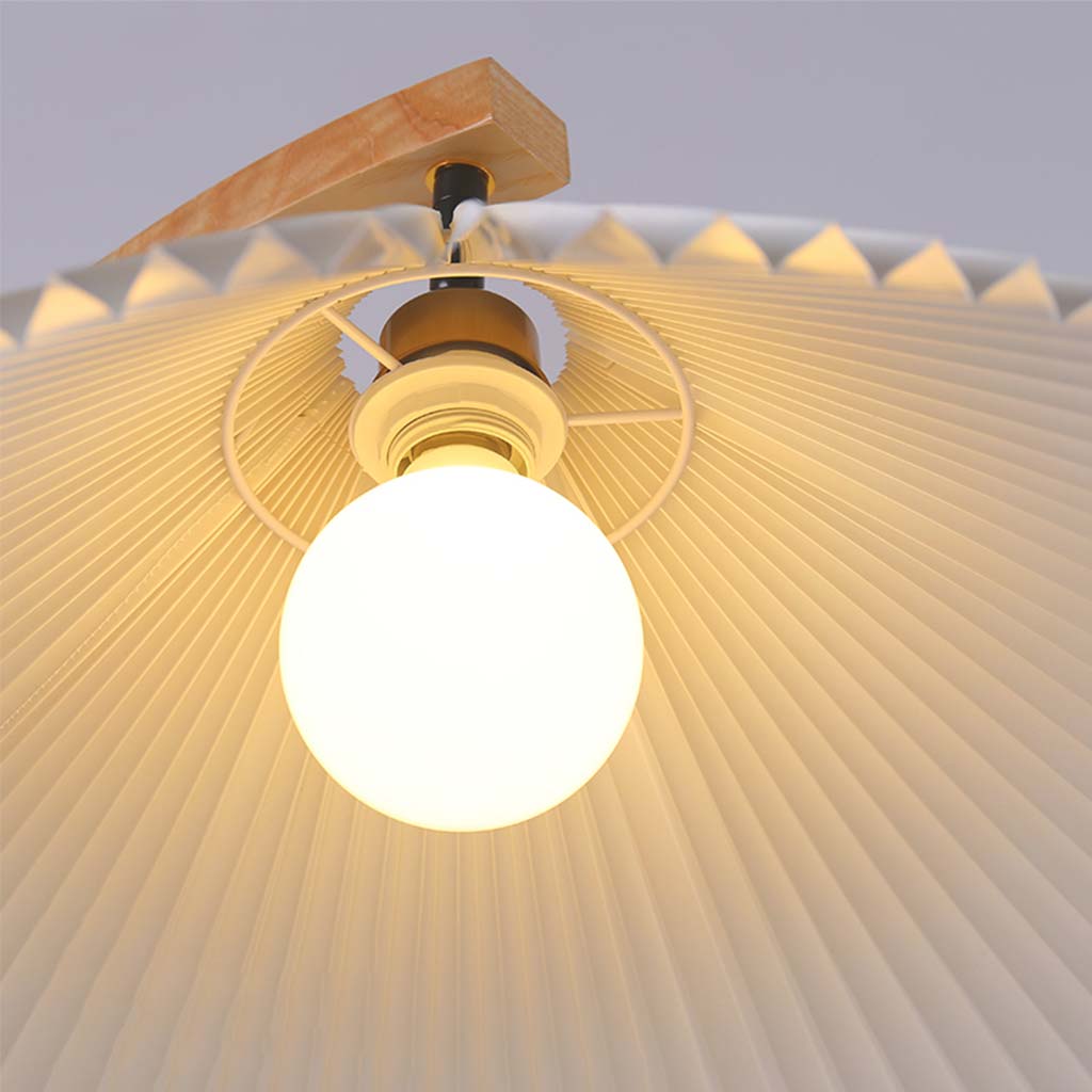 Lampadaire moderne courbé avec abat-jour plissé, bois et fer