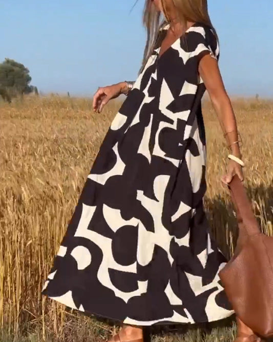 Amara™ - Robe maxi imprimée avec décolleté en V